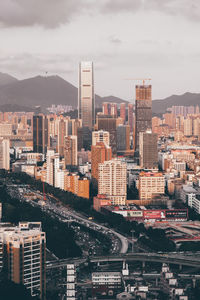 High angle view of buildings in city against sky