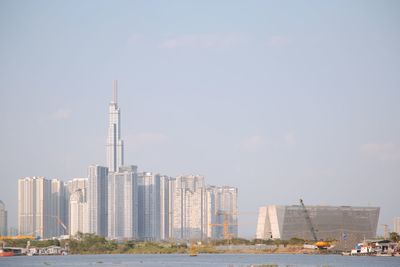 Modern buildings in city against sky