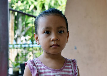 Portrait of cute girl looking away