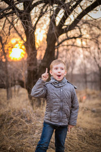 Portrait of boy on field