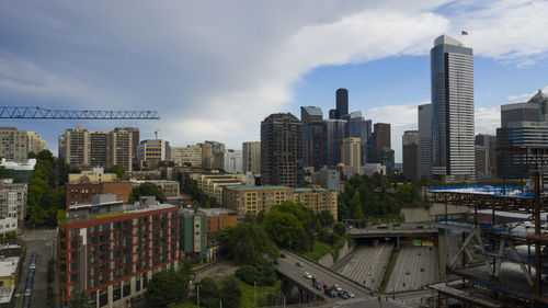 High angle view of buildings in city against sky