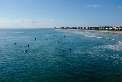 Surfers waiting for a wave in the ocean