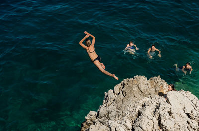 High angle view of people in sea