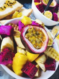 High angle view of fruits in plate on table