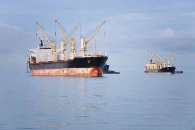 Ship in sea against sky