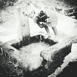 Full length of woman standing in park