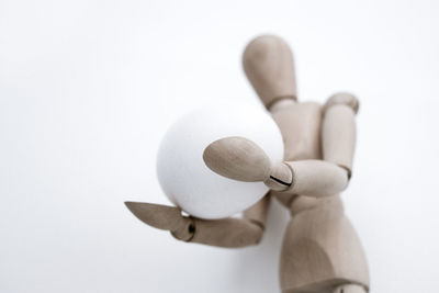 Close-up of stuffed toy against white background