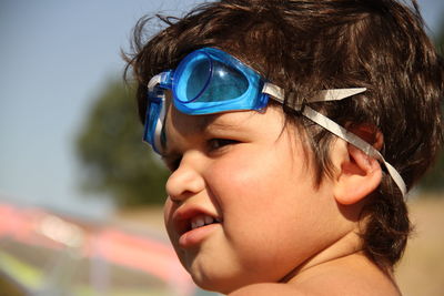 Close-up portrait of boy looking away