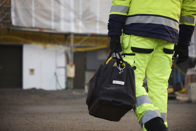 Rear view of engineer at building site