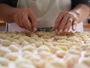 Close-up of man preparing food