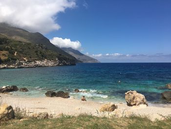 Scenic view of sea against blue sky