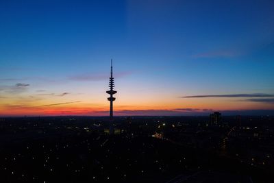 Hamburg heinrich hertz tower against the sunset sky