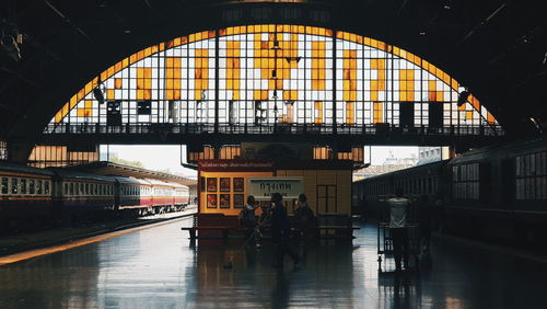 People at railroad station