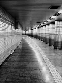 The empty subway station passage.
