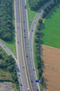 High angle view of road amidst trees