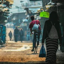 Full length of woman standing in park