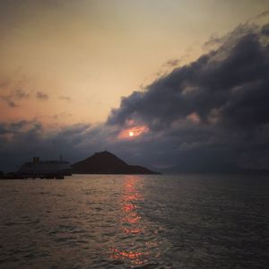 Scenic view of sea against sky at sunset