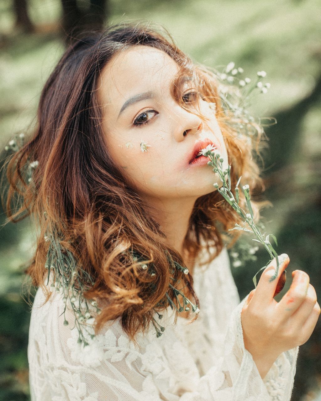 CLOSE-UP PORTRAIT OF BEAUTIFUL YOUNG WOMAN WITH WATER