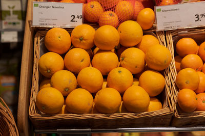 Fruits in basket for sale at market stall