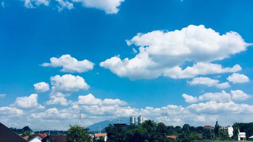 Panoramic view of city buildings against sky