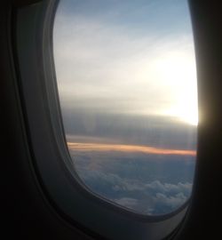 Sunset seen through airplane window