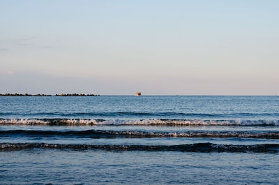 Scenic view of sea against clear sky