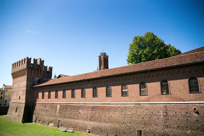 View of historic building against blue sky