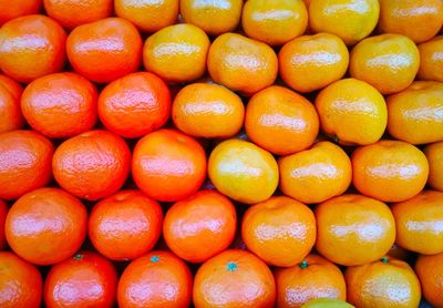 Full frame shot of oranges in market