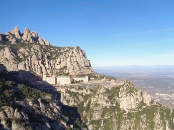 Scenic view of rock formations against sky