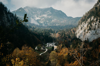 High angle view of trees and buildings against sky