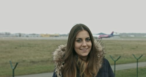 Portrait of smiling young woman