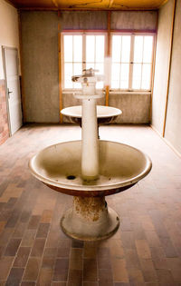 View of empty room with window in bathroom