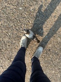 Low section of man standing on floor