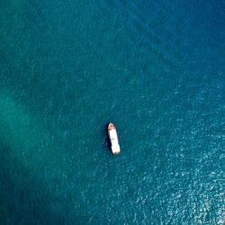 Aerial view of boat moored on sea