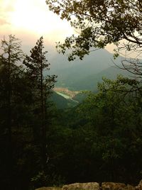Scenic view of mountains against sky at sunset