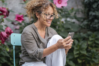 Young woman using mobile phone