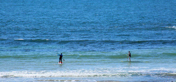 Man standing on sea shore