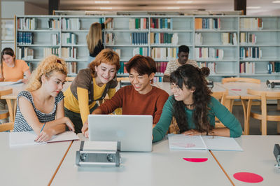 School students working at office