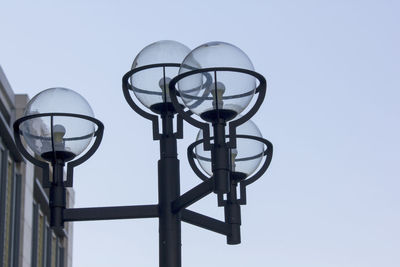 Low angle view of gas light against clear sky