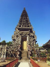 View of temple against clear blue sky