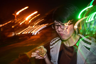 Close-up of young man wearing eyeglasses