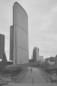 Modern buildings in city against sky