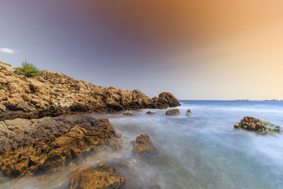 Scenic view of sea against clear sky