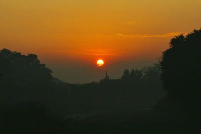 Scenic view of silhouette landscape against sky during sunset