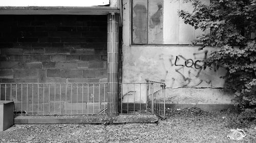 Graffiti on wall of old building