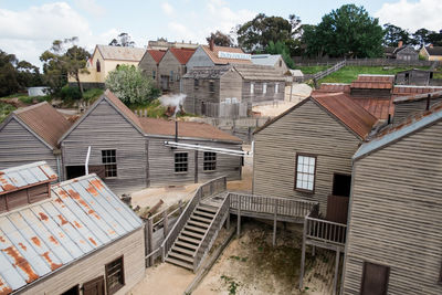 High angle view of residential buildings against sky