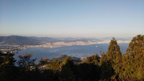 High angle view of trees and mountains against sky