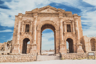 Arch of hadrian facade against sky