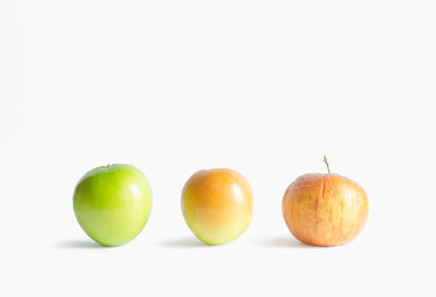 Close-up of apple against white background