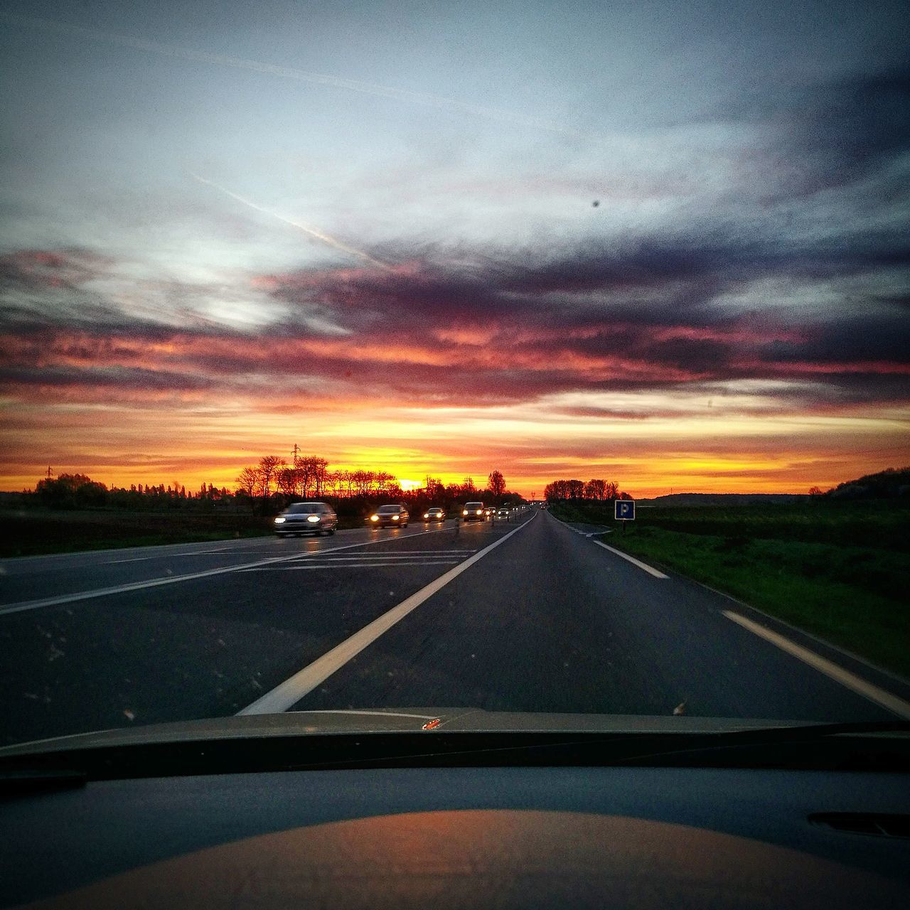 car, transportation, sunset, road, windshield, no people, sky, the way forward, car interior, mode of transport, nature, land vehicle, cloud - sky, tree, scenics, beauty in nature, outdoors, day